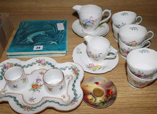 A Shelley Wildflowers part tea set, a Dresden inkstand, two Minton & Hollins tiles and a Worcester fruit painted saucer